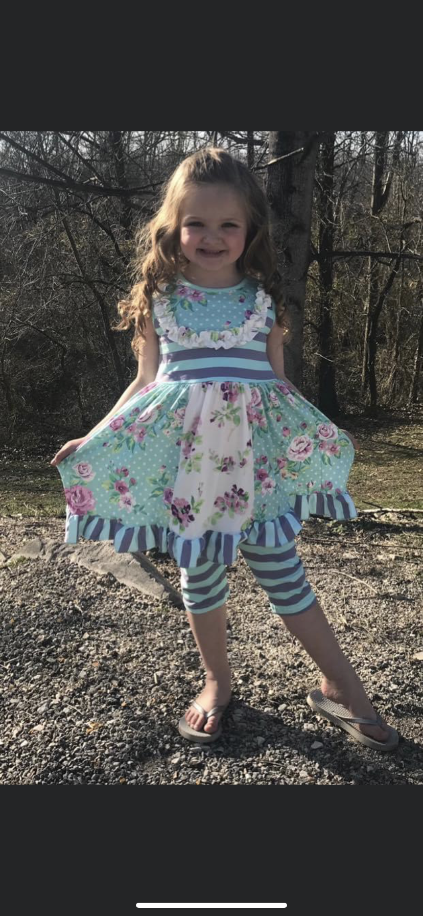 1182 Floral top with ruffle detail and striped print short bottoms